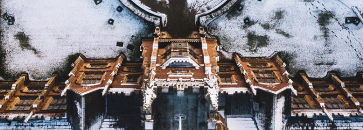 close-up snow-covered aerial view of the entrance to the Lanyon Building